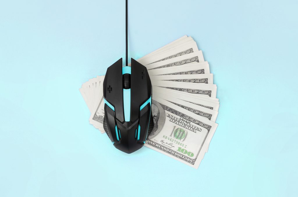 money underneath marketer's mouse